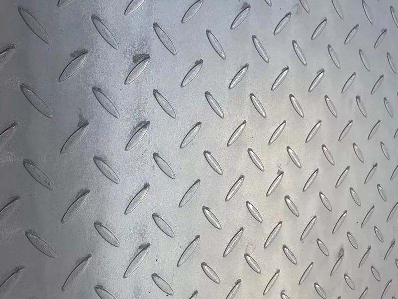 How Does Diamond Plate Enhance Safety and Durability in Industrial Spaces?